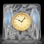 A RENÉ LALIQUE FROSTED AND POLISHED OPALESCENT GLASS 'INSÉPARABLES' CLOCK