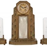 French Art Deco Three-Piece Gilt-Metal and Molded Glass Illuminated Figural Clock Garniture