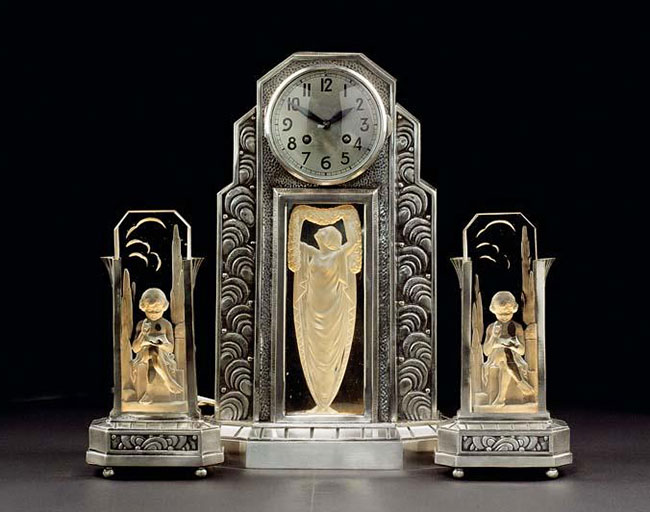 A French Art Deco bronze and Hettier & Vincent moulded glass clock garniture circa 1930