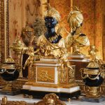 An ormolu and patinated-bronze mounted, white and black marble musical and automaton mantel clock, Louis XVI, Paris, circa 1784, the mechanism by Jean-Baptiste-André Furet and François-Louis Godon, the gilt-bronze base attributed to Etienne Martincourt
