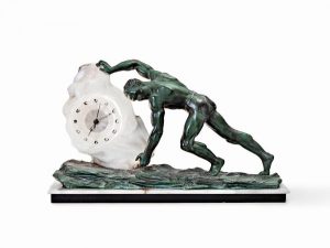 Art Déco table clock with male figurine